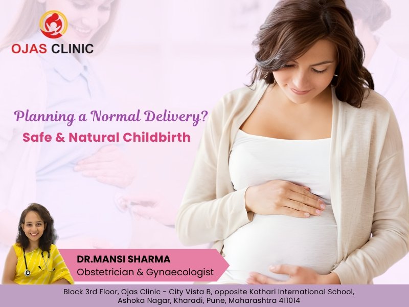 Pregnant woman receiving guidance for safe and natural normal delivery by Dr. Mansi Sharma at Ojas Clinic, Best Gynecologist in Kharadi Pune
